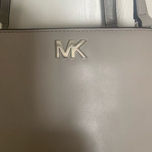 Michael kors gray smooth leather. MK silver emblem Shoulder bag new with tags